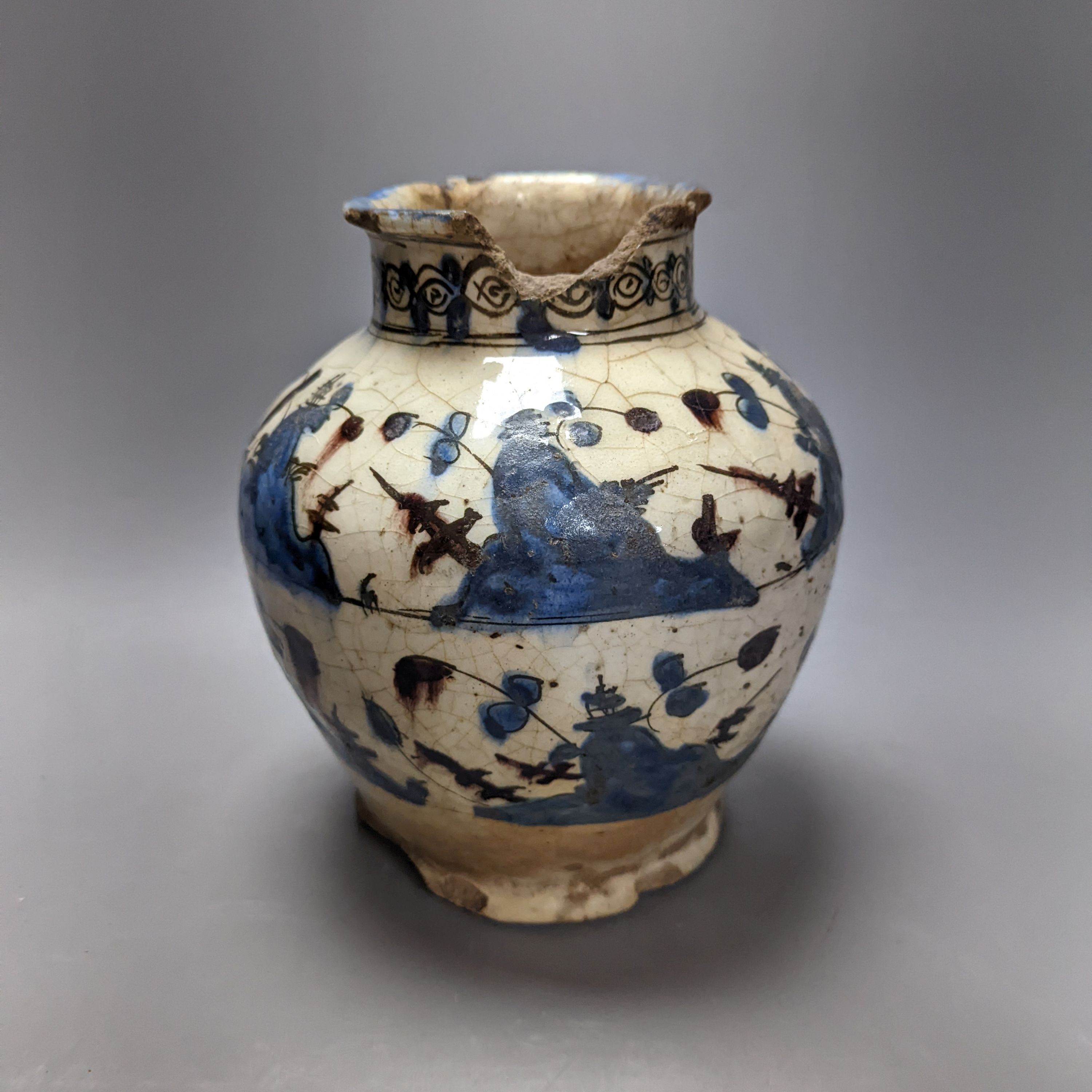 A Persian fritware jar, probably 17th century. 22cm